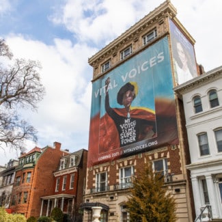 vital voices headquarters exterior shot with grand opening banner