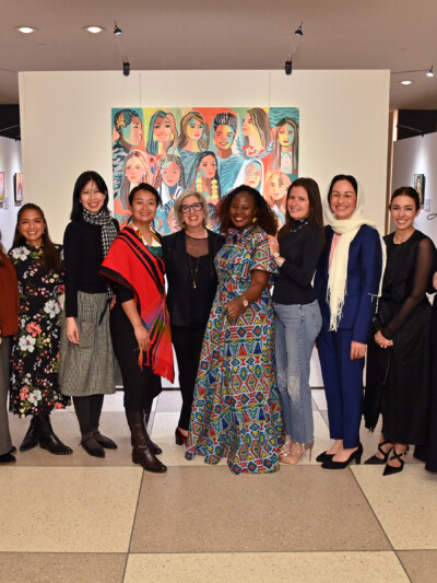 NEW YORK, NEW YORK - FEBRUARY 29: (L-R) Annemarie Hou, Dr Yetunde Ayo-Oyalowo, Aline Sara, Leah Lizarondo, Michelle Hong, Zeinorin Angkang, Gayle Kabaker, Hellen Lunkuse Waiswa Tanyinga, Inna Braverman, Shirin Musa, Sarah El Battouty, Sara Minkara and Alyse Nelson attend the Vital Voices Women’s History Month reception for the unveiling of “Portraits of Progress: Women Powering the Global Goals,” an interactive art exhibit about women leaders who are solving the Sustainable Development Goals at the United Nations Headquarters in New York in collaboration with the UN Office of Partnerships  (Photo by Bryan Bedder/Getty Images for Vital Voices Global Partnership )