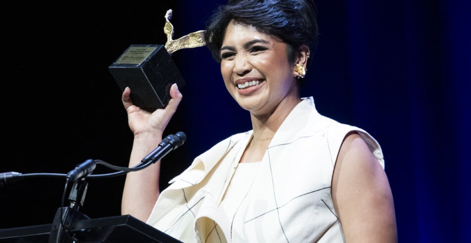 Global Leadership Award honoree Farwiza Fahan celebrates with her award — a symbol of leadership in environmental conservation.