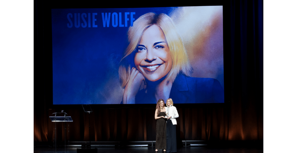 Sophia Bush gives the award to Susie Wolff, 2026 Icon Award honoree and Managing Director of F1 Academy.