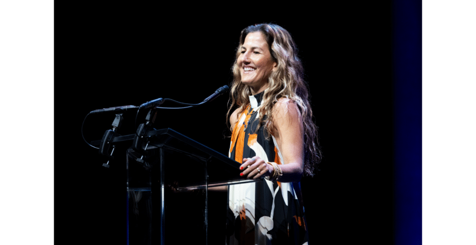 Ariela Suster, presenter of the 2026 Global Leadership Award, introduces the award's honoree.